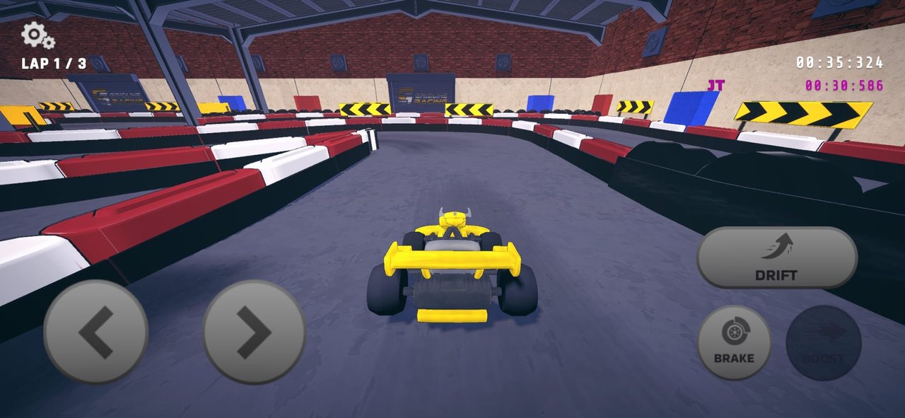Racing a kart round the 3D version of a real indoor track, with a friend's ghost time on screen